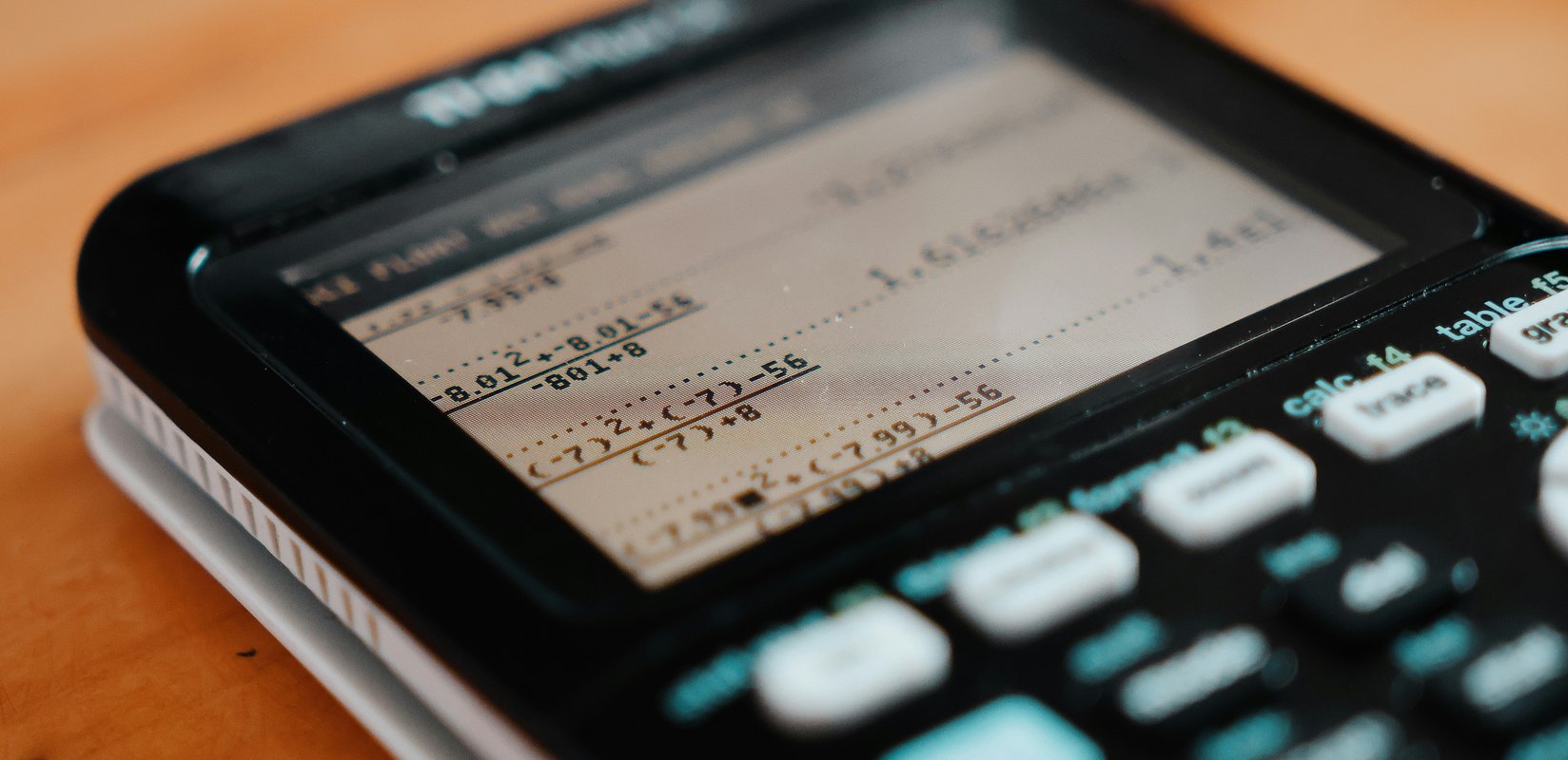 A graphing calculator with an exponent problem on it