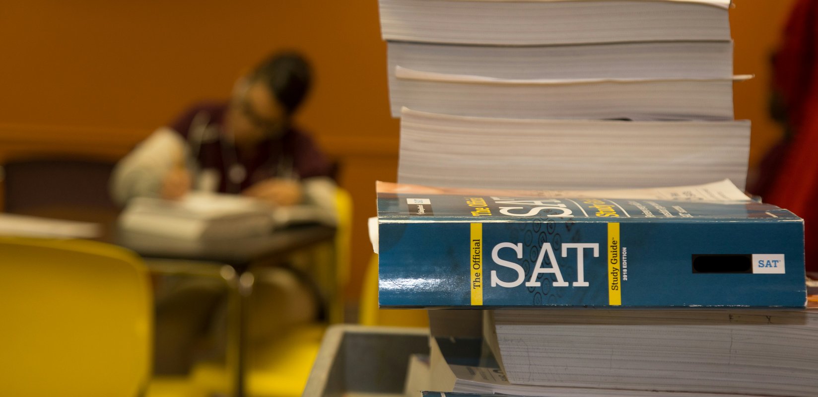 a stack of sat prep books